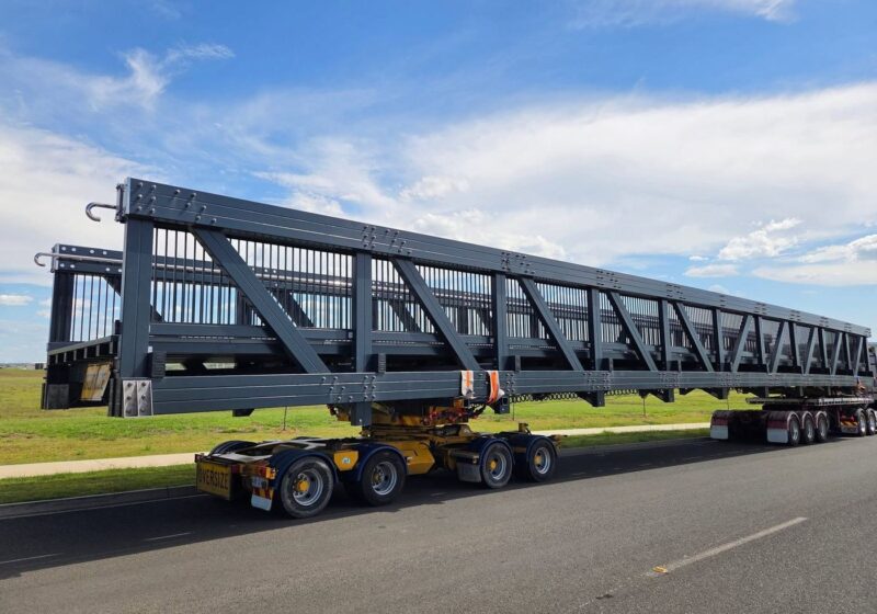 Bridge section loaded on the extendable trailer