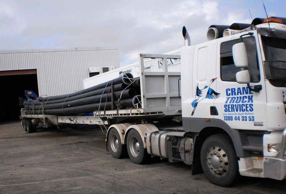 Crane truck loading freight