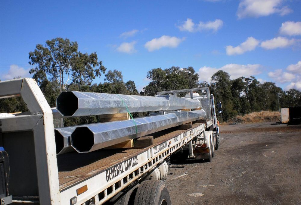 Flat top trailer loaded with steel pipe