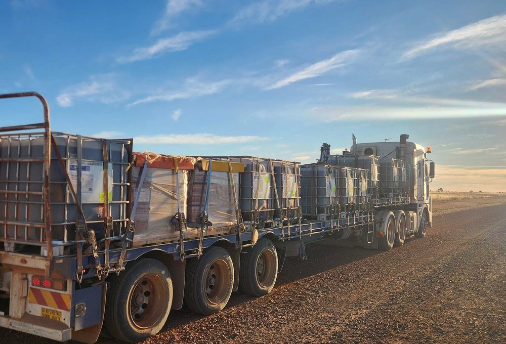 Road train combination at sunset