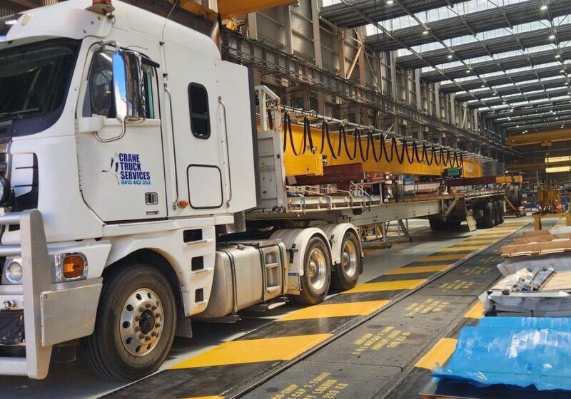 Steel gantry loaded for transport