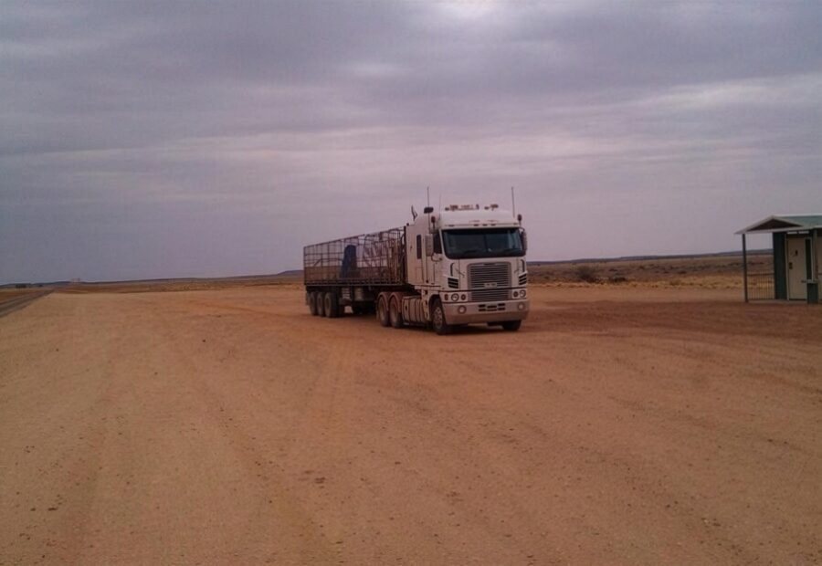 Structural freight loaded on a flat top trailer