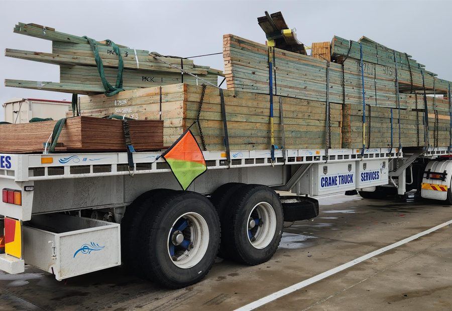 Structural freight loaded on a flat top trailer