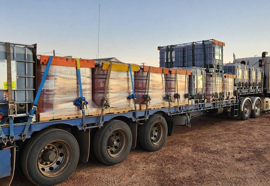 Mining equipment on a road train at a remote site