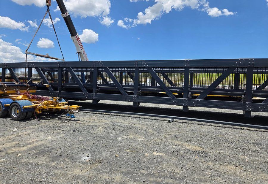Over-dimensional steel bridge truss prepared for transport