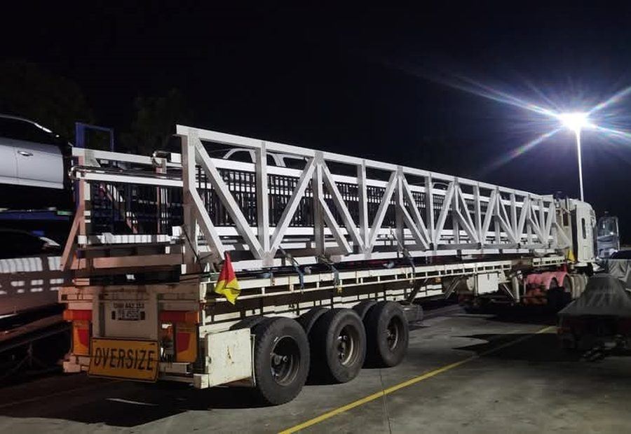 Vehicles and specialised equipment loaded for relocation
